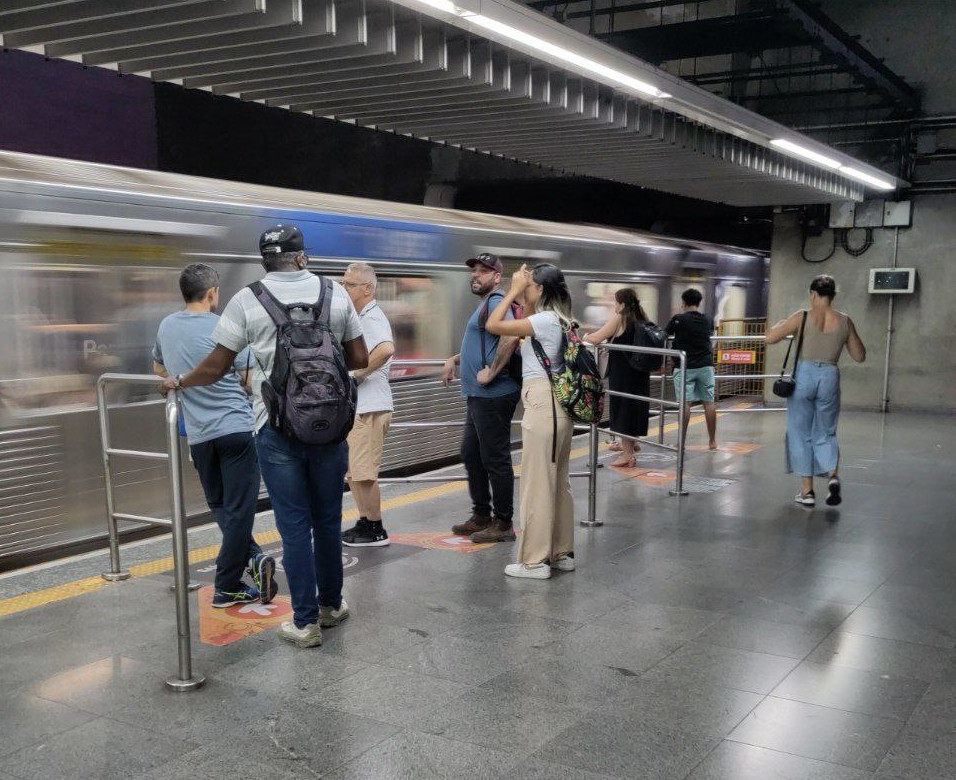 Metro station with railing and markings - entry and exit is on the same side