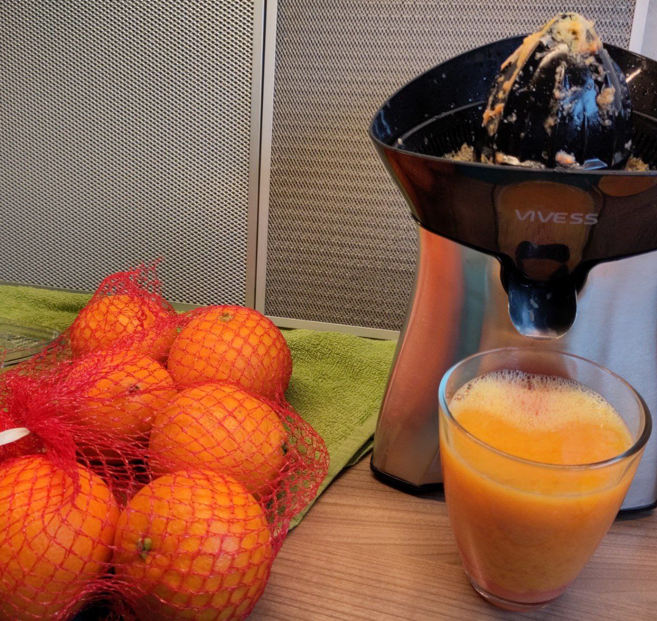 Orange study with the juicer